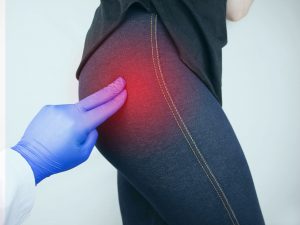 What causes buttock pain