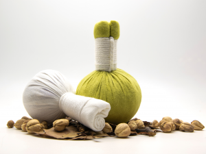 Herbal compress massage